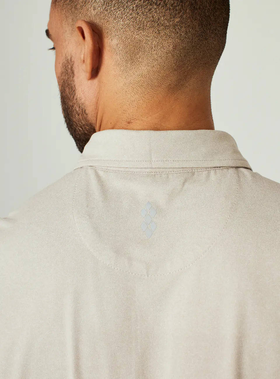 Core Polo in Heathered Sand